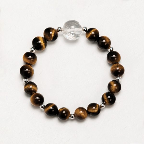 Sunlit Resolve natural crystal bracelet with Golden Tiger’s Eye and Clear Quartz on a white background.